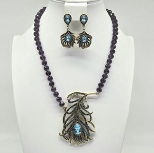 Heidi Daus Amethyst Swarovski Crystal Large Peacock Feather Necklace
